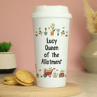 Close up of personalised travel mug featuring Plant Your Dreams gardening design