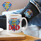 Personalised Super Dad mug and socks gift set with bold design