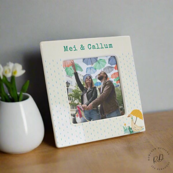 Personalised baby photo frame with puddle duck design