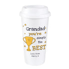 White travel mug with 'Grandad you're simply the best' text and trophy graphic on a white background