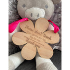 Natural beech wood pram sign with safety message and soft blue ribbon – perfect for newborn outings.

