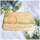 Close-up of a wooden tea and biscuit board with a custom engraved message, showcasing a secure cup slot and elegant design, perfect for birthdays, anniversaries, or festive gifts.