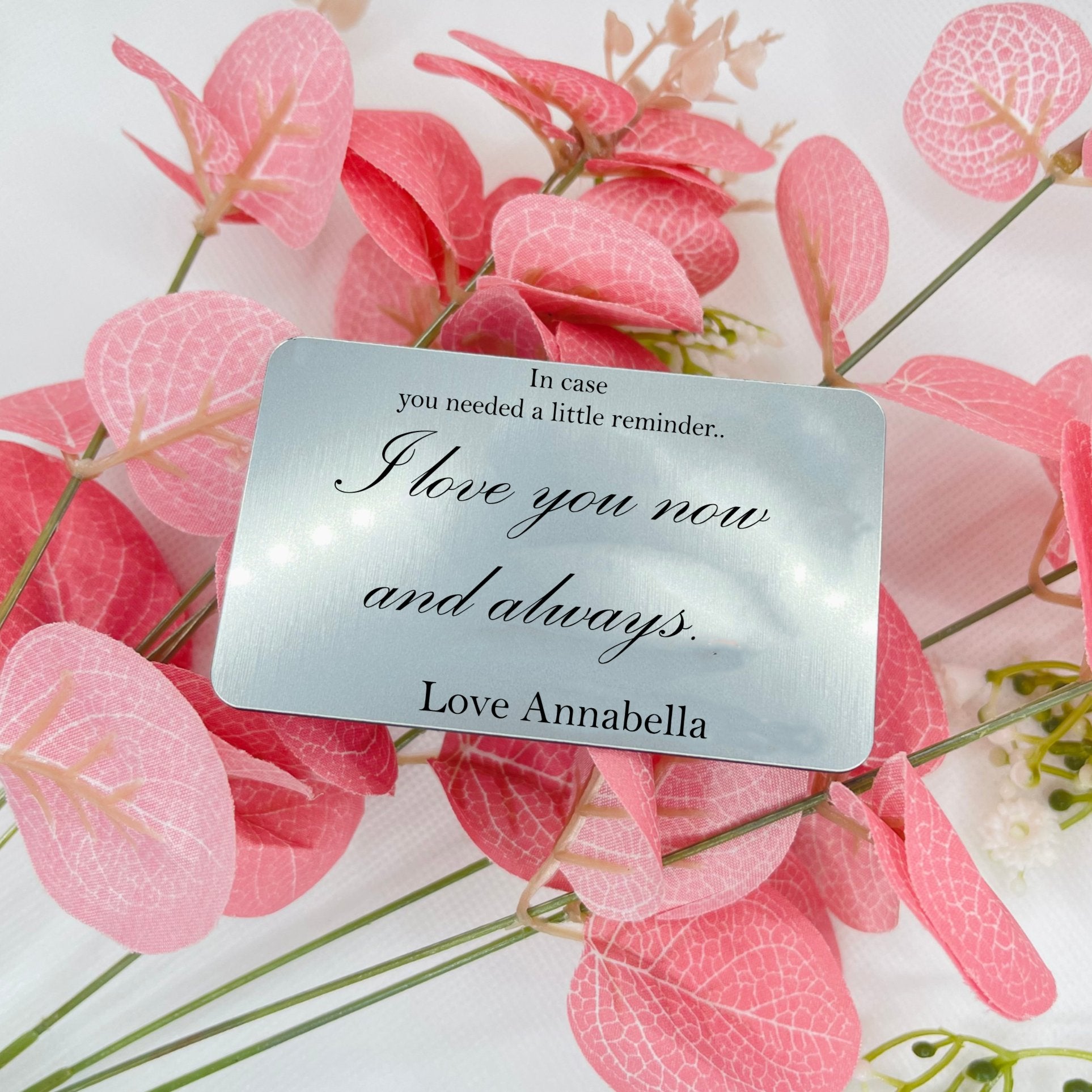 A delightful wallet insert, an ideal gift for couples on occasions like Valentine's Day, anniversaries, birthdays, weddings, and beyond. Designed to slip seamlessly into credit card slots, this non-metal item won't disrupt cards or belongings. With a personalized name at the base, it's the perfect keepsake for any memorable event.