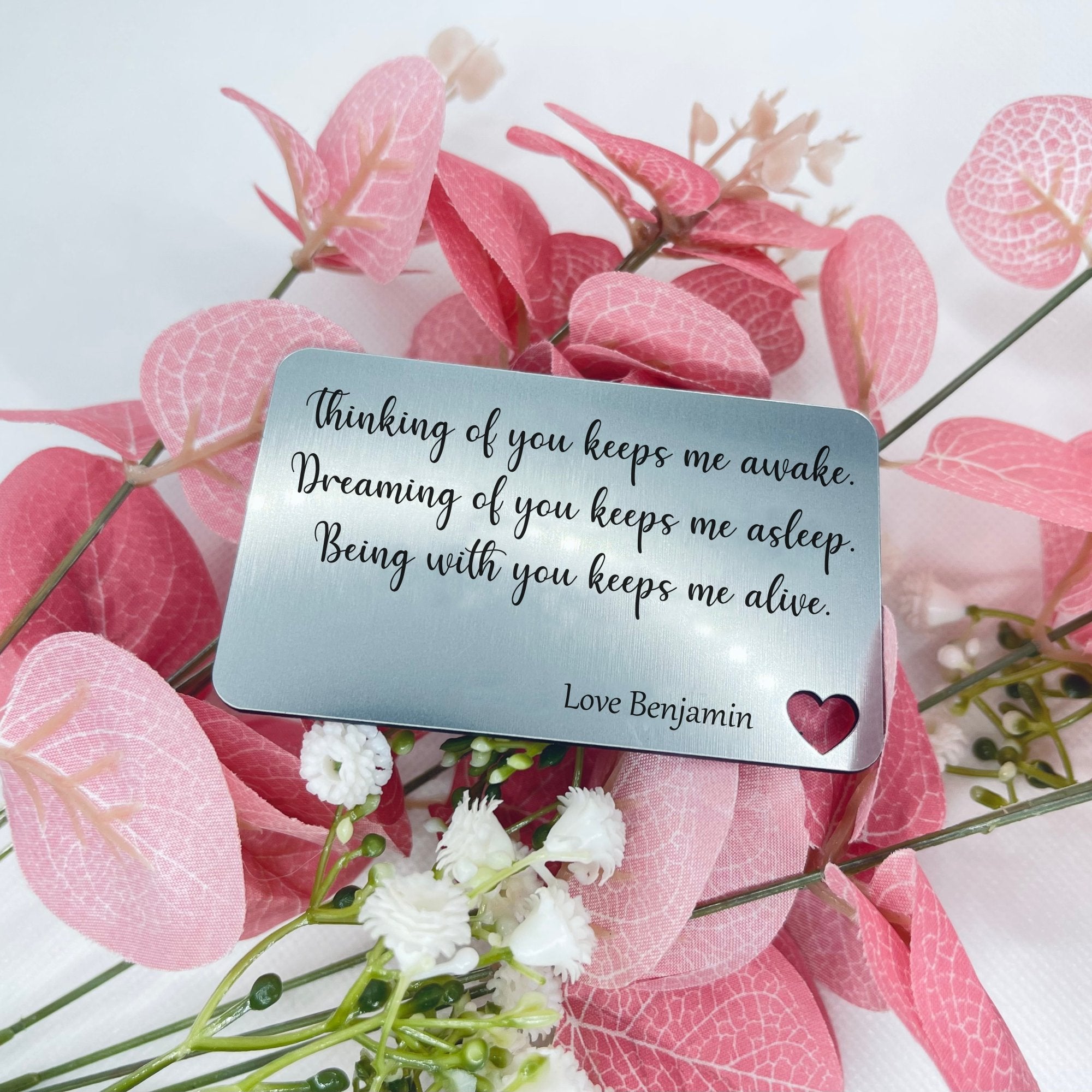 Upgrade your style with our Personalised Wallet Insert, a thoughtful gift for him on Valentine's Day or birthdays. Engraved with a heartfelt message, this chic silver card boasts a slim profile for easy wallet integration. Express your love with a durable and elegant accessory.