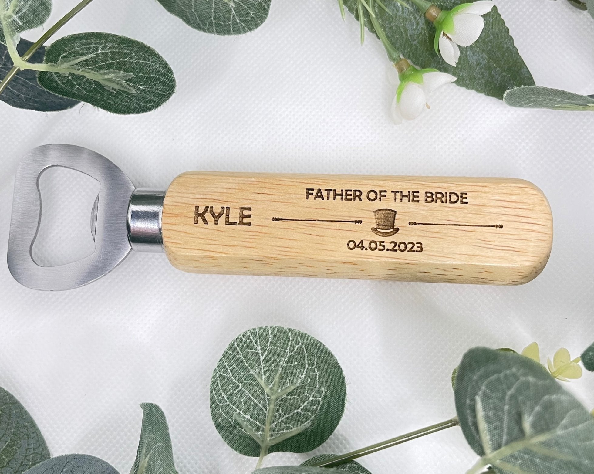 A personalised wooden bottle opener with a top hat design, perfect as an engraved wedding gift.

