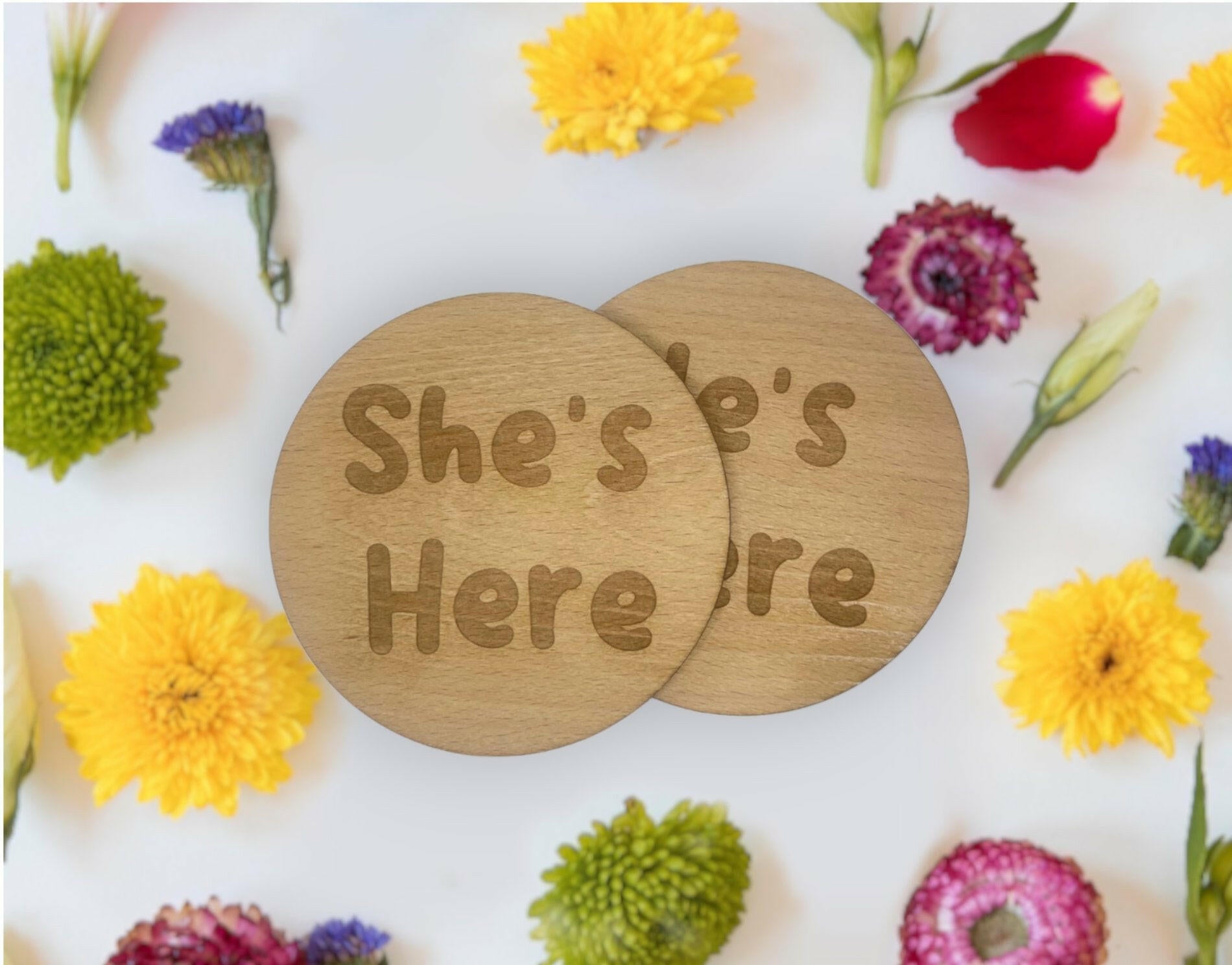  Handcrafted wooden baby birth announcement sign with a leaf design, perfect for a photo shoot.